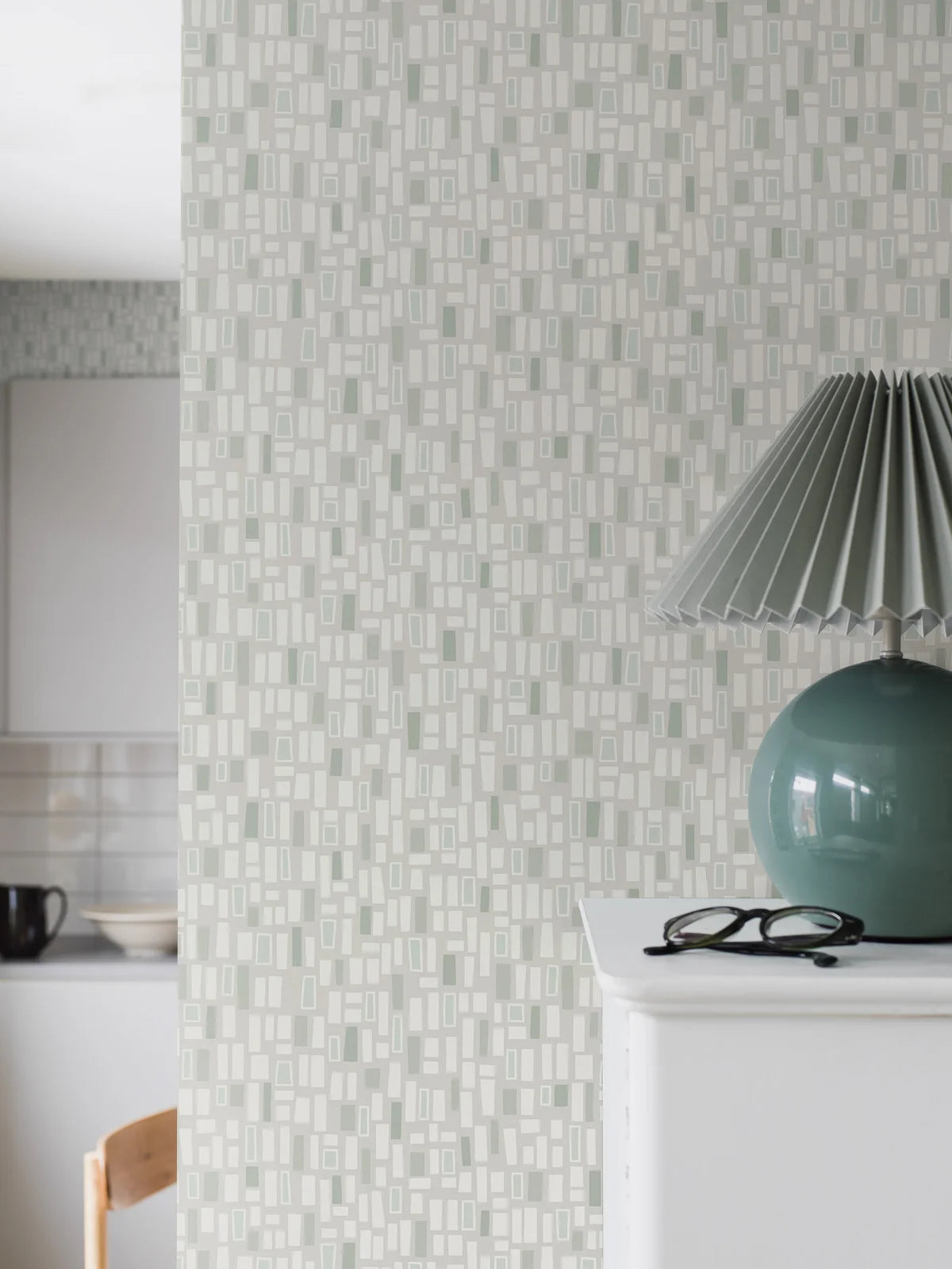Paper non-woven wallpaper with a green and white geometric pattern ELVIS