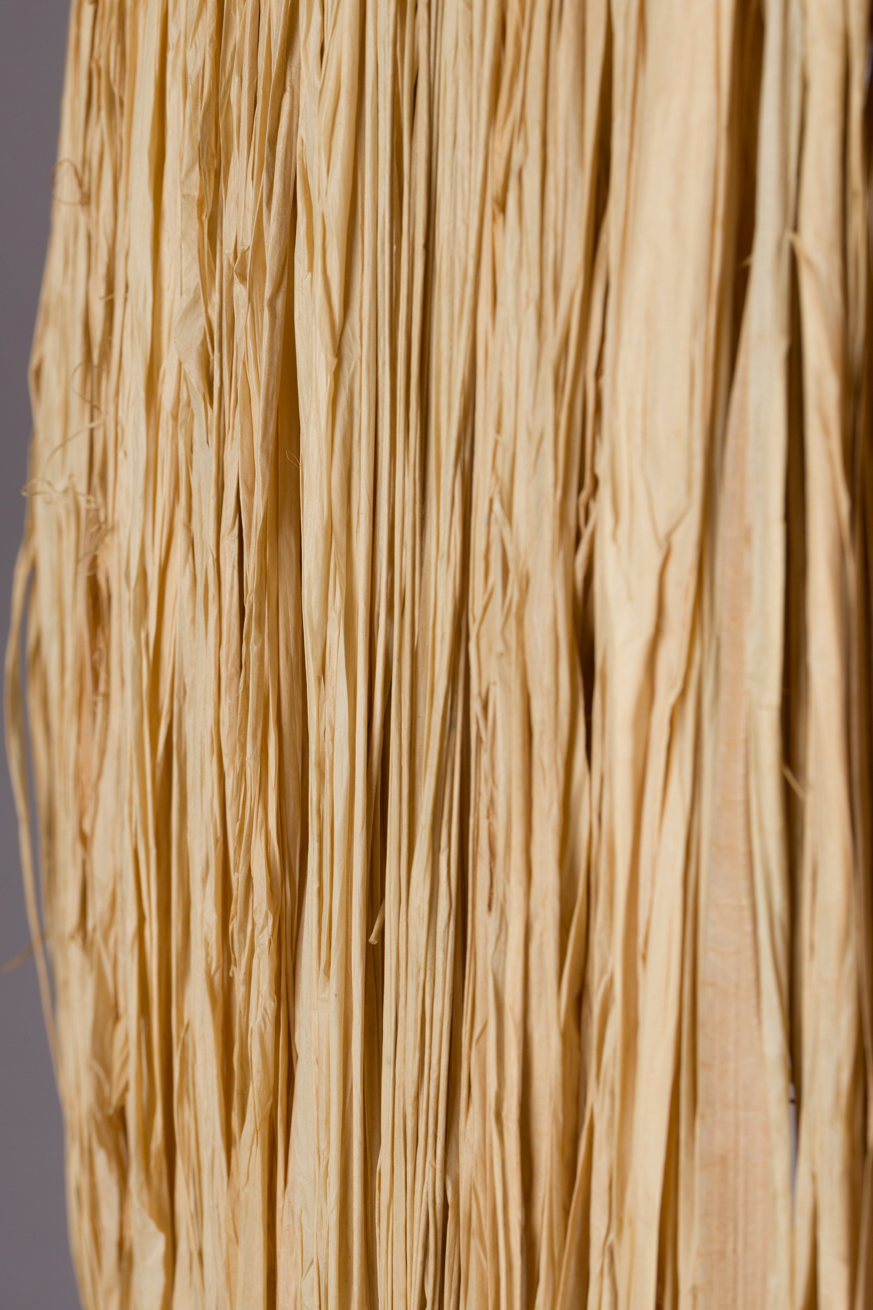 AFRA lamp in light brown with a plum base