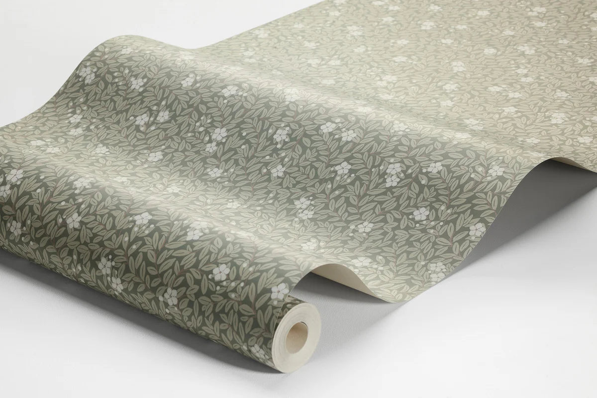 Wallpaper with a floral pattern of flowers and leaves MYRTEN green with white