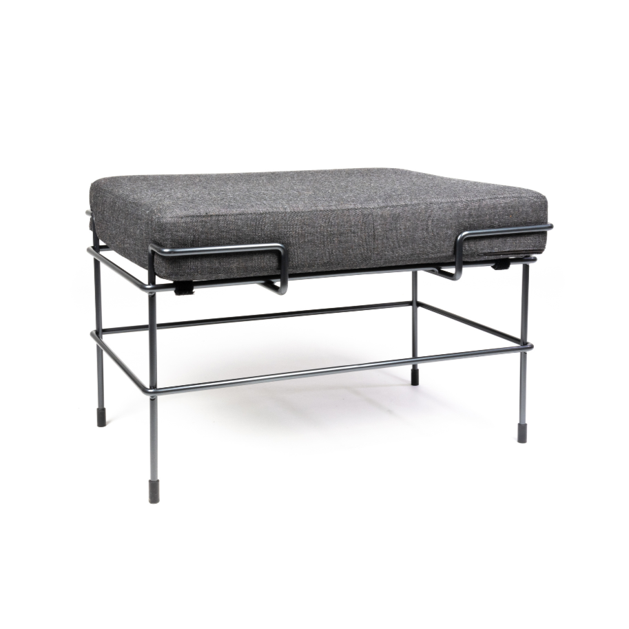 TRAFFIC upholstered pouf with a black steel base