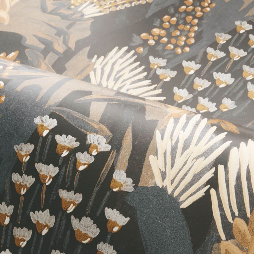Wallpaper with a plant motif of leaves and flowers ERICA - ANTHRACITE/SABLE warm anthracite