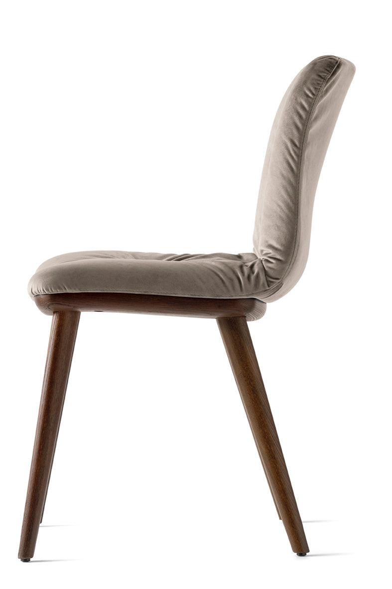 ANNIE SOFT upholstered chair with a dark wooden base
