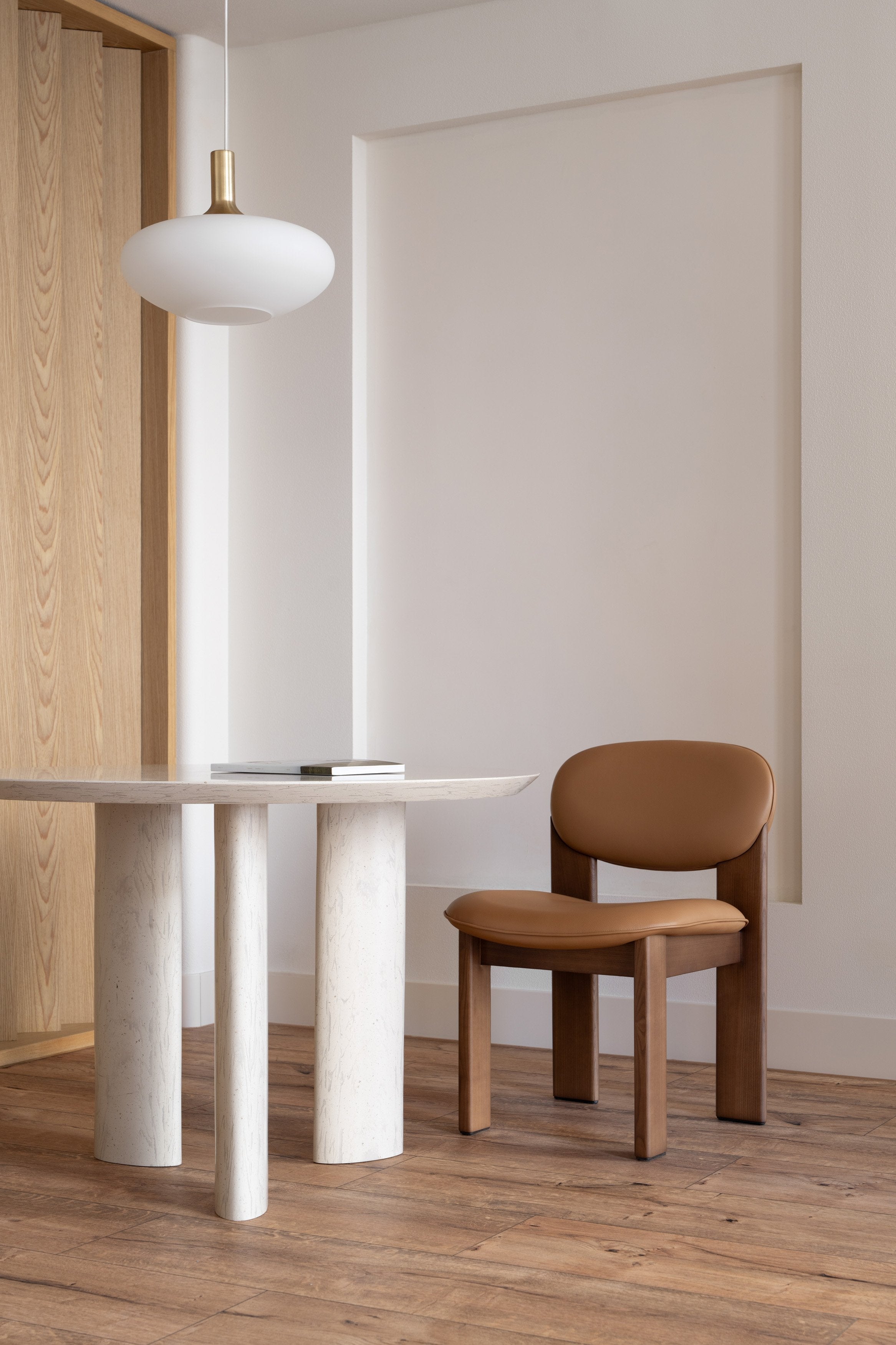 ARCHIPEN upholstered chair with a brown ash base