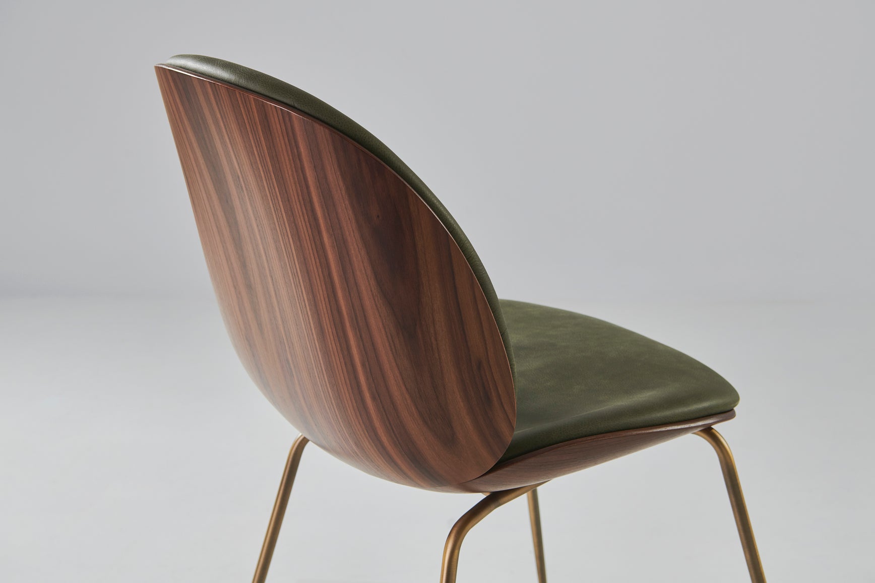 BEETLE upholstered chair with oak wood and black chrome base