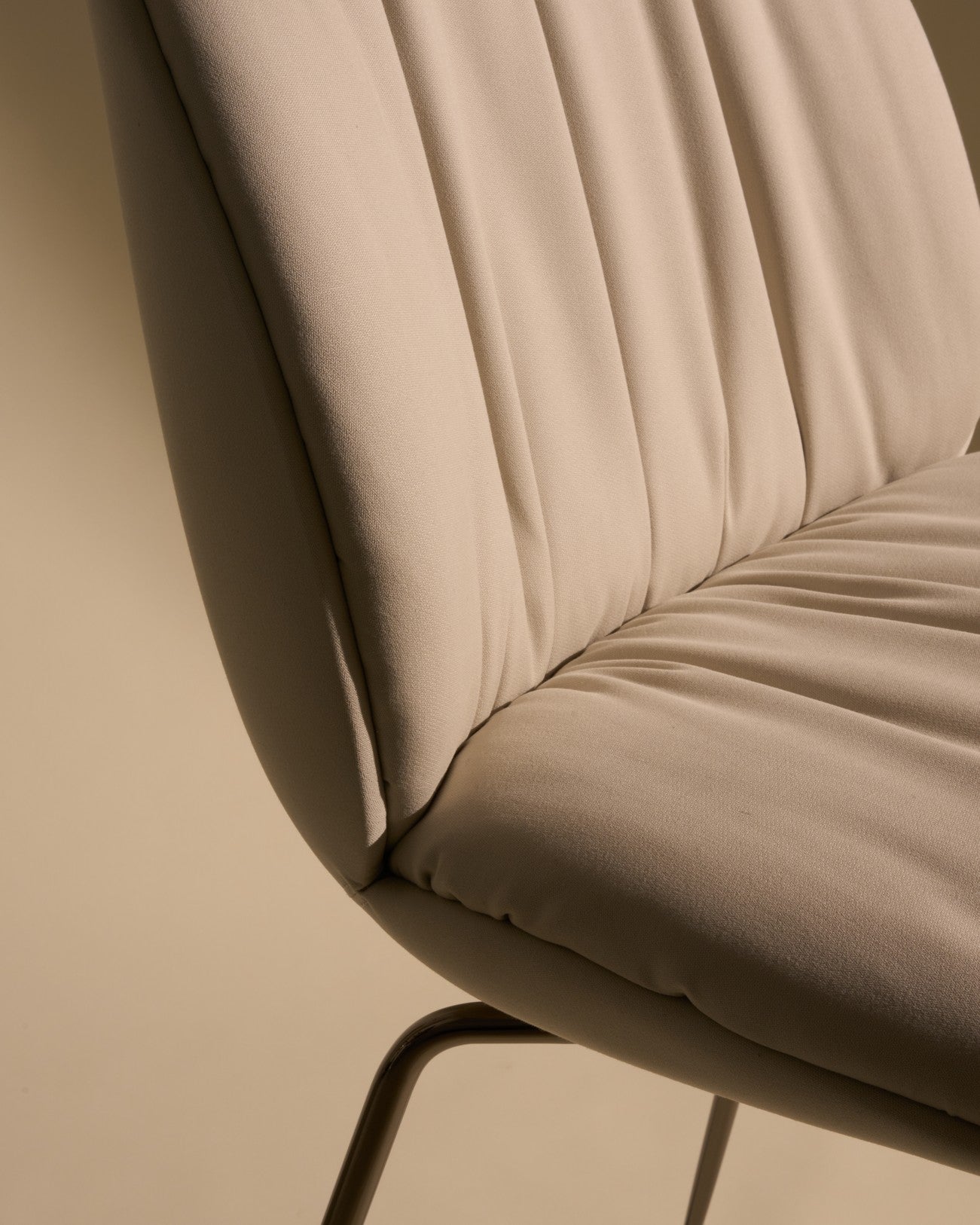 BEETLE SOFT upholstered bar stool with a black chrome base