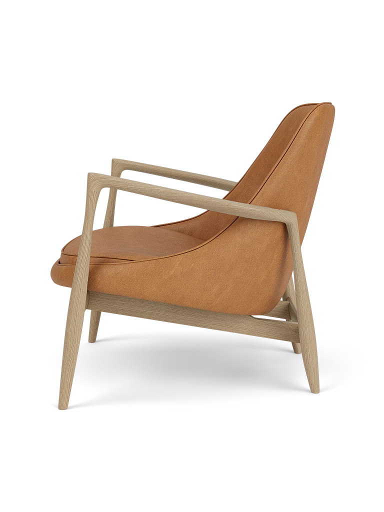 ELIZABETH armchair in cognac leather with oak base