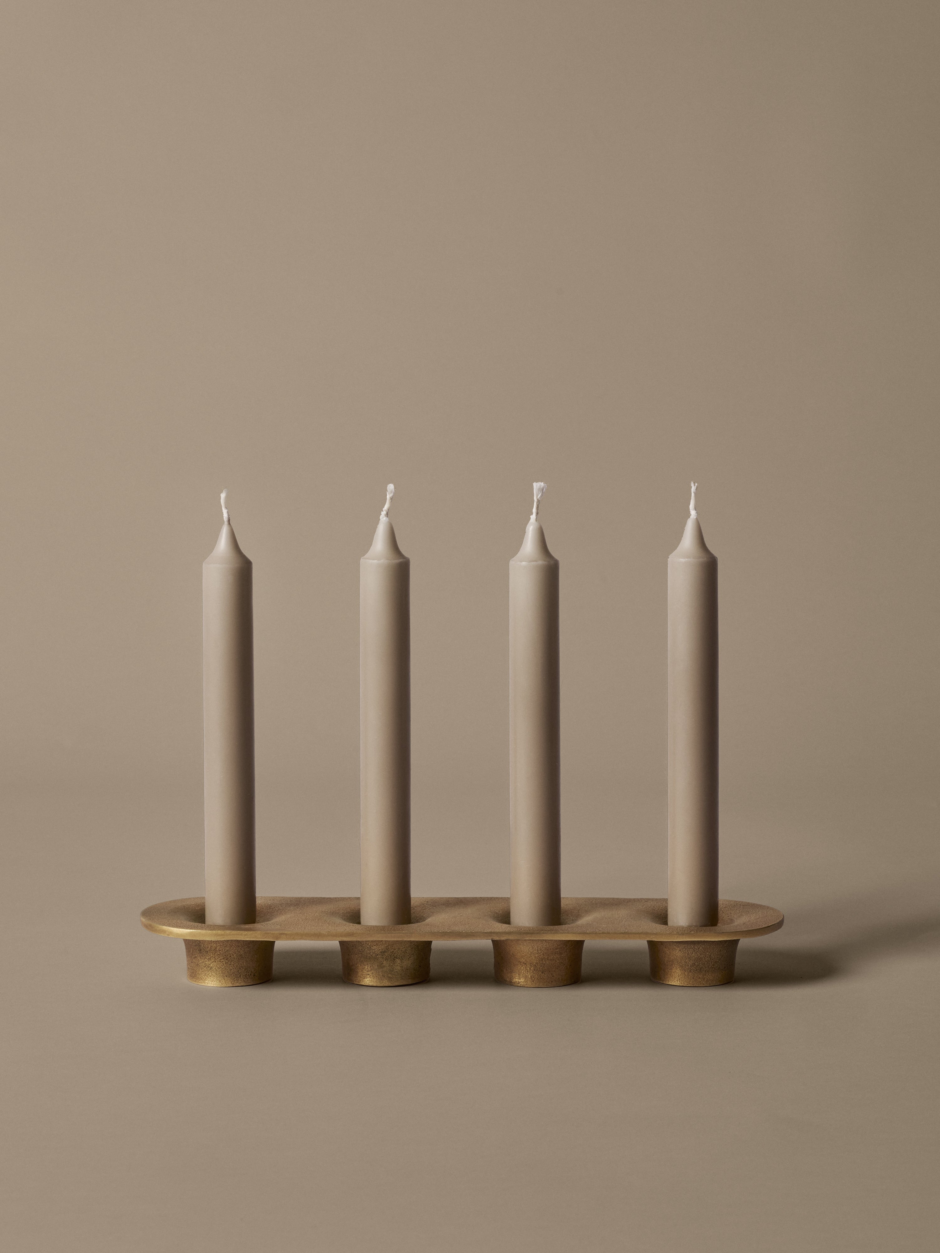 SOOTHE four-part candle holder with brass finish