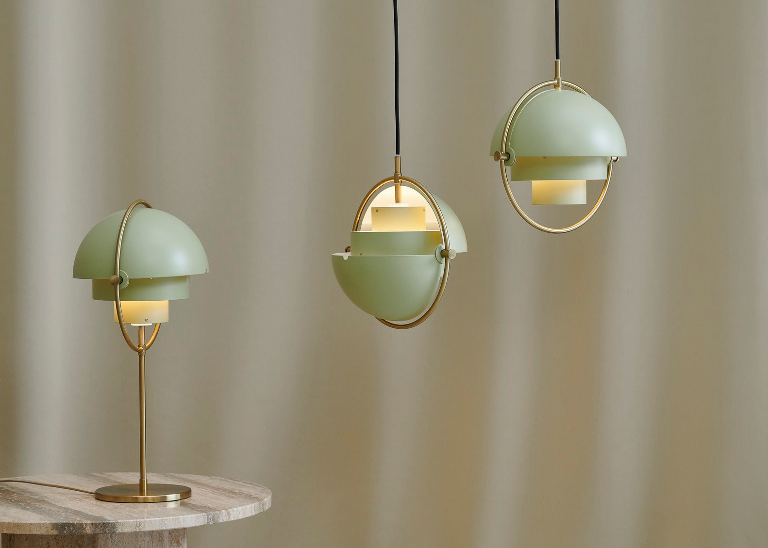 MULTI-LITE table lamp in light green with a brass base