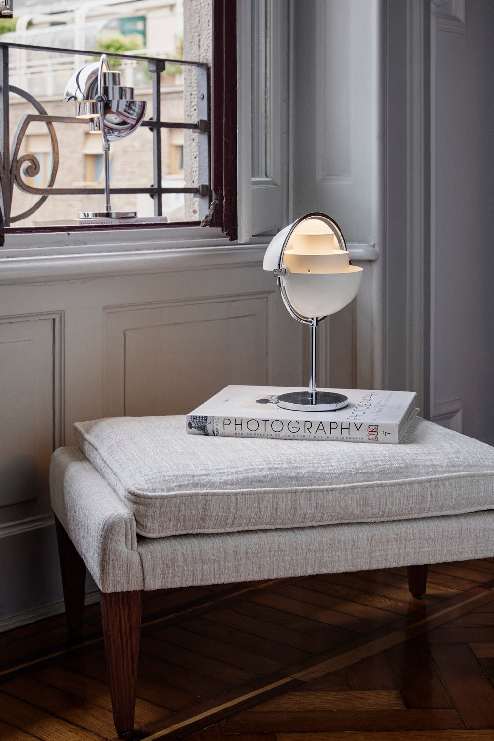 MULTI-LITE portable lamp in cream with a brass base