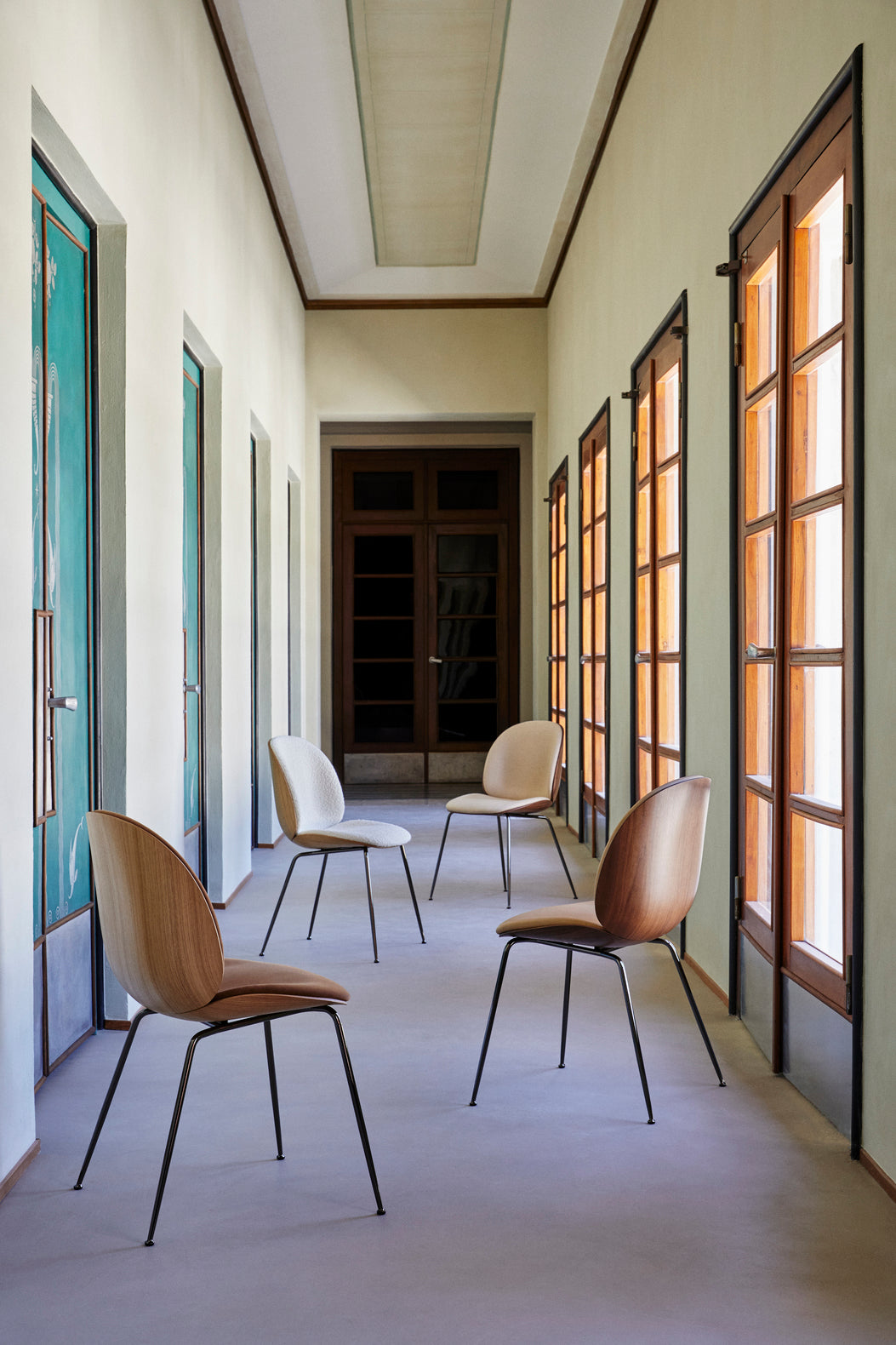 BEETLE upholstered chair with oak wood and black chrome base