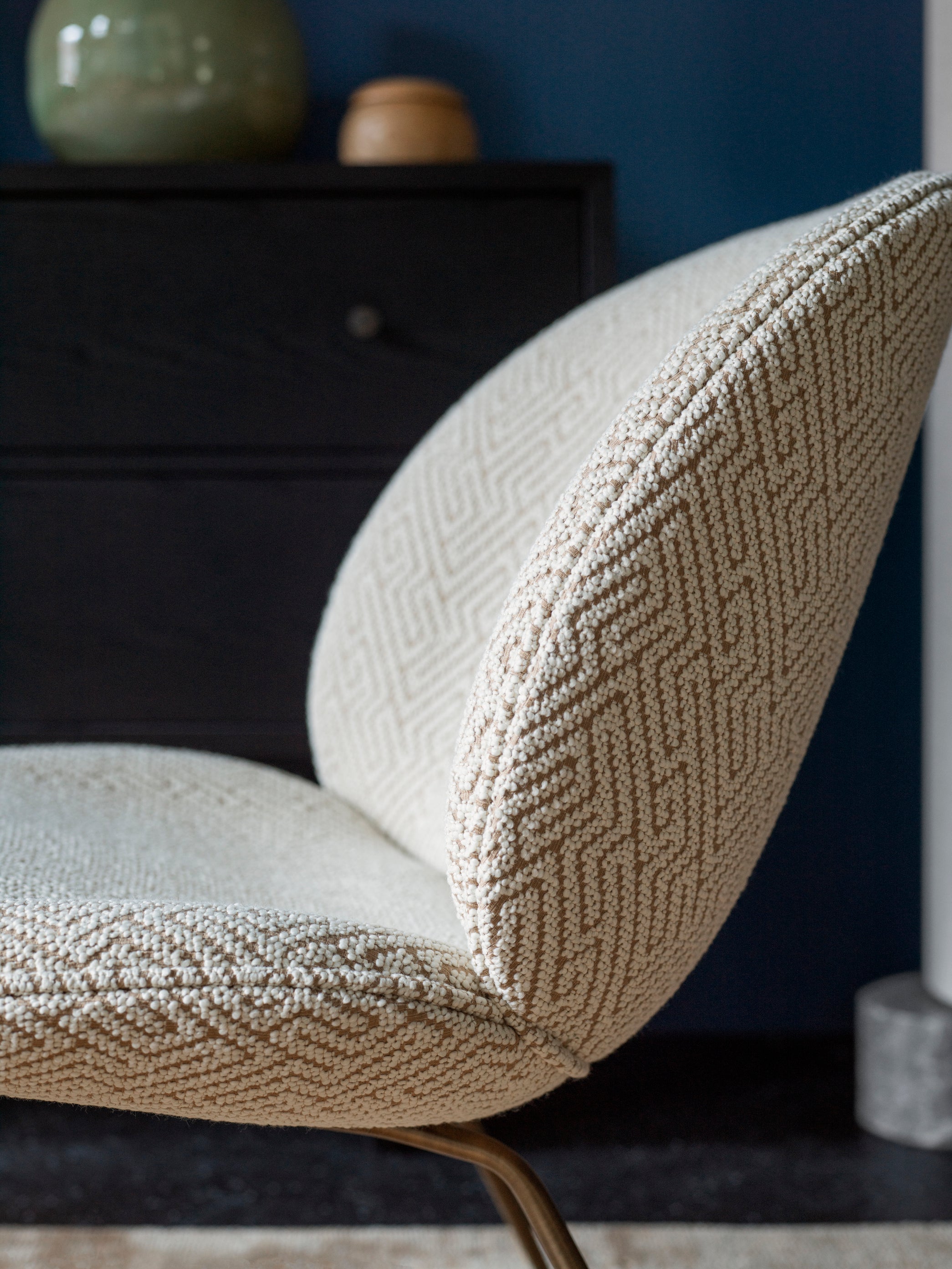 BEETLE armchair upholstered with a gold base