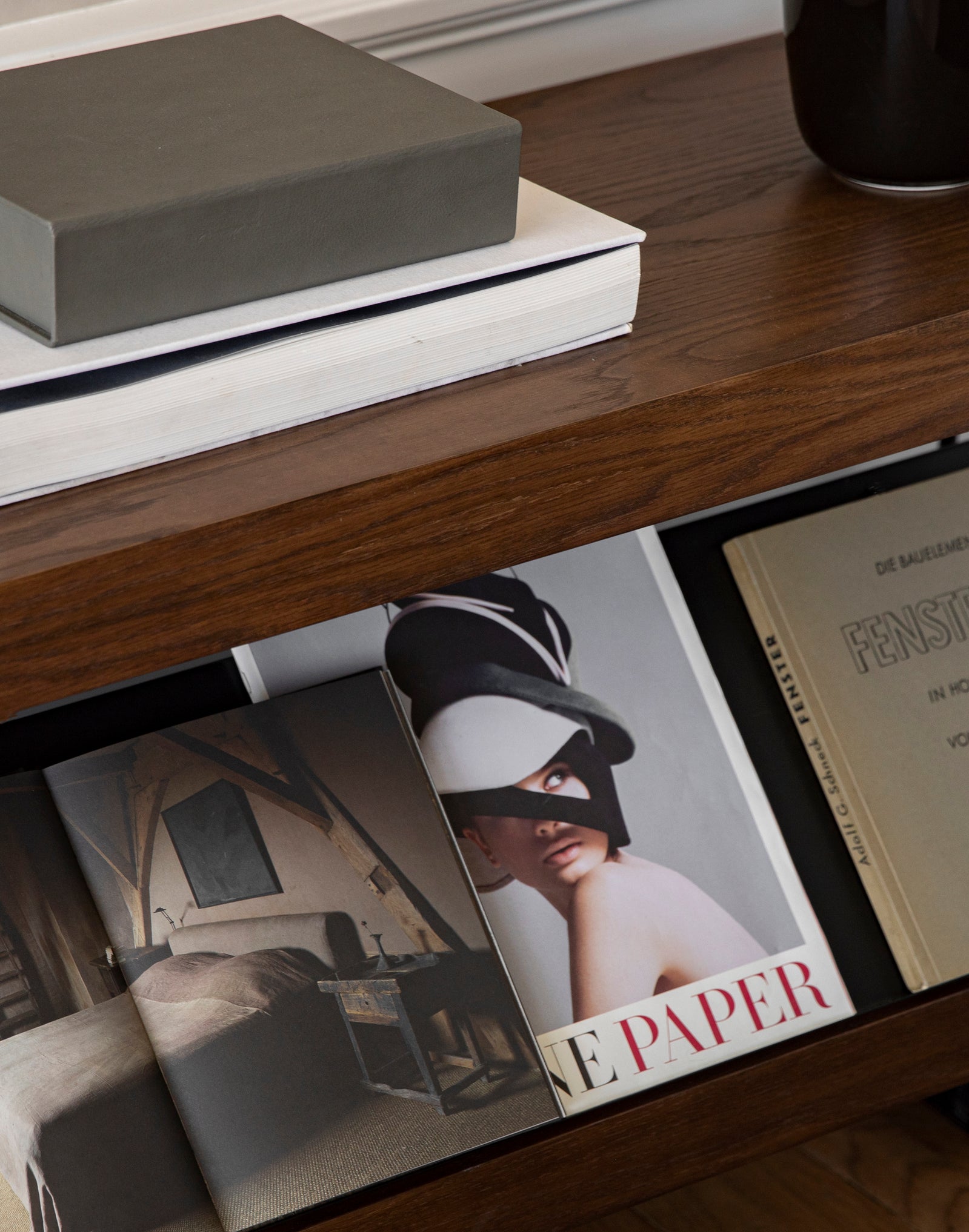 ZET shelf in dark oak wood with a black frame