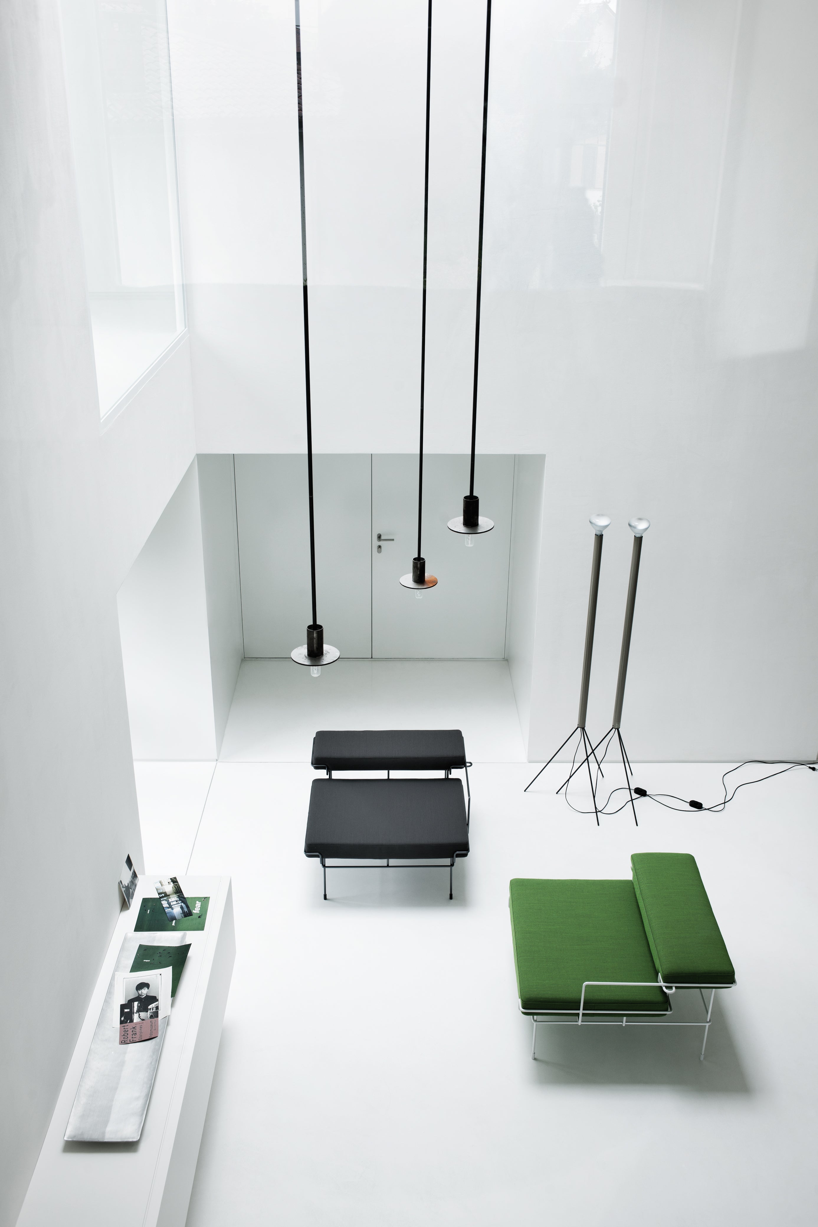 TRAFFIC upholstered pouf with a white steel base