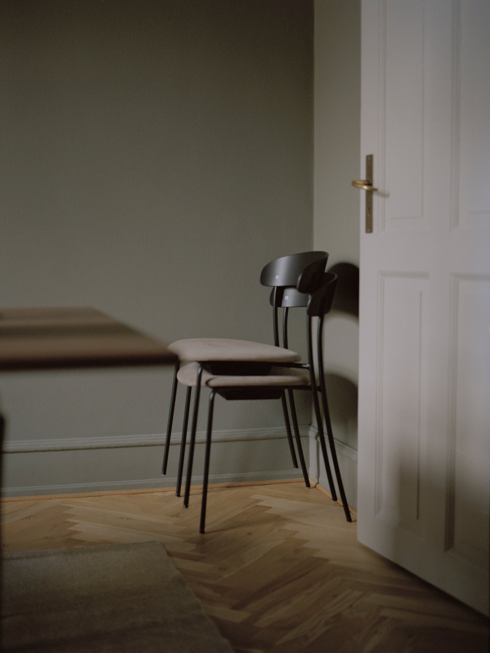 Missing upholstered chair with black ash veneer