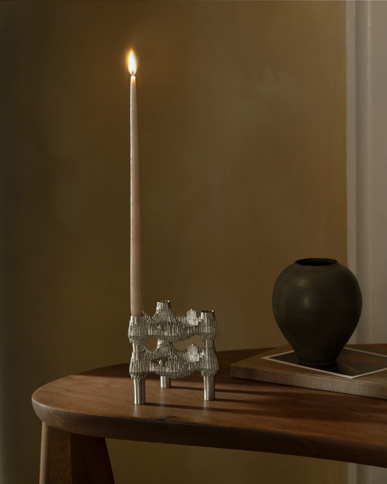 QUIST brushed chrome candle holder