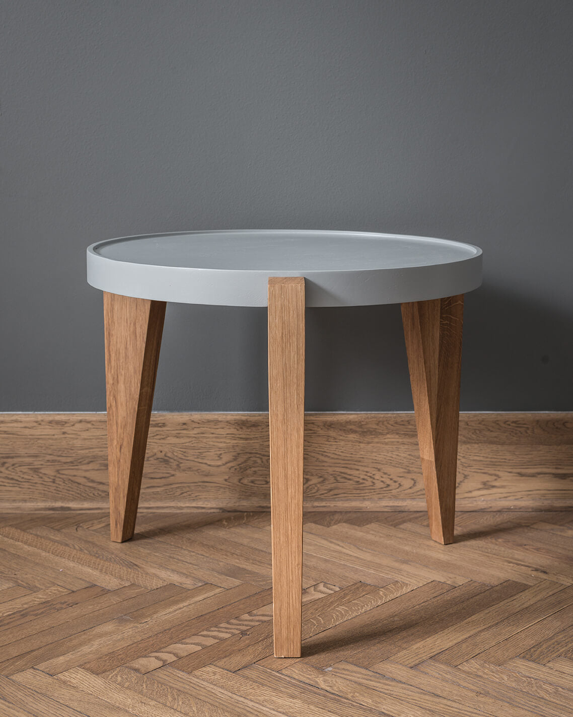BONTRI table with a gray top and wooden base