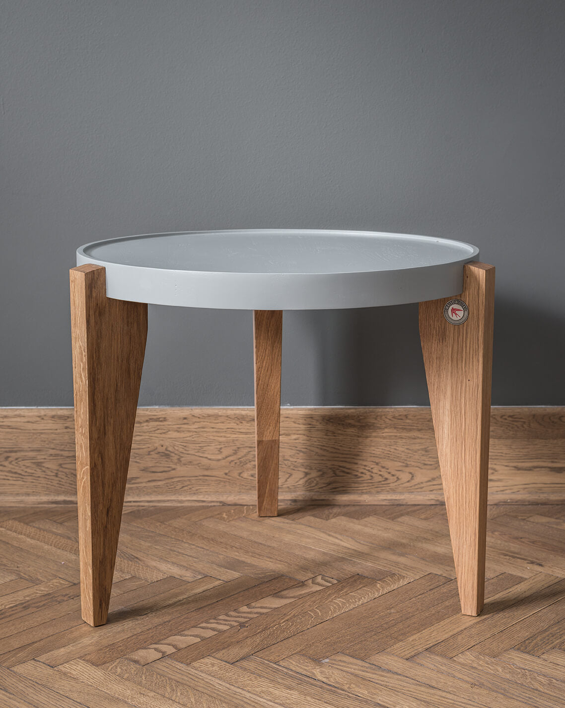 BONTRI table with a gray top and wooden base
