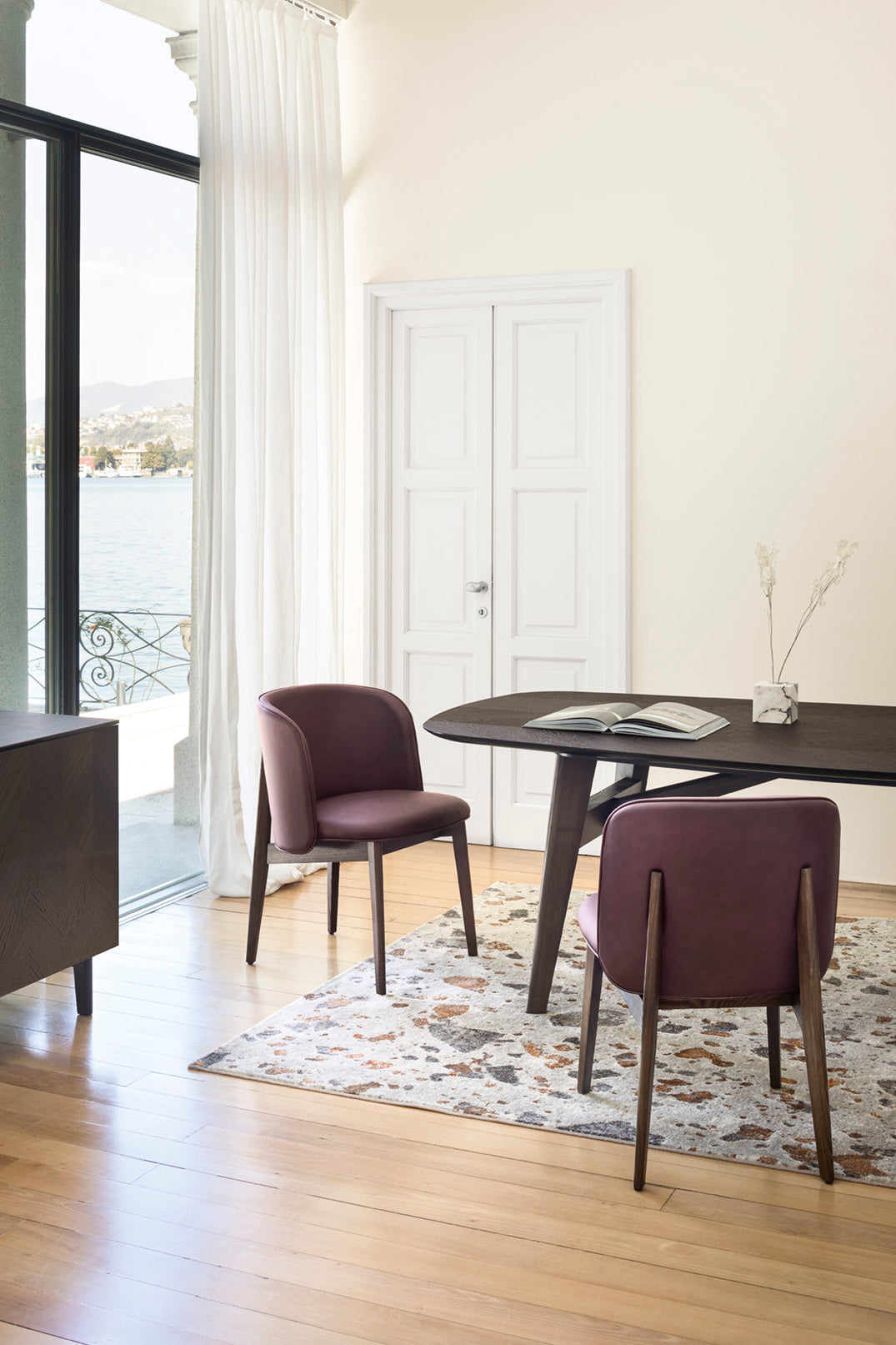 Armchair ABREY upholstered with a black wooden base