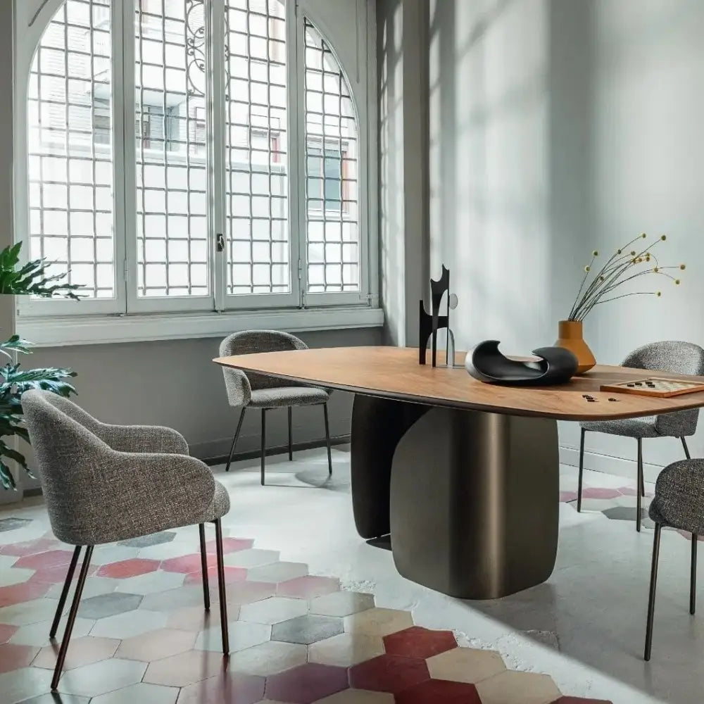 HOLLY upholstered chair with a black wooden base