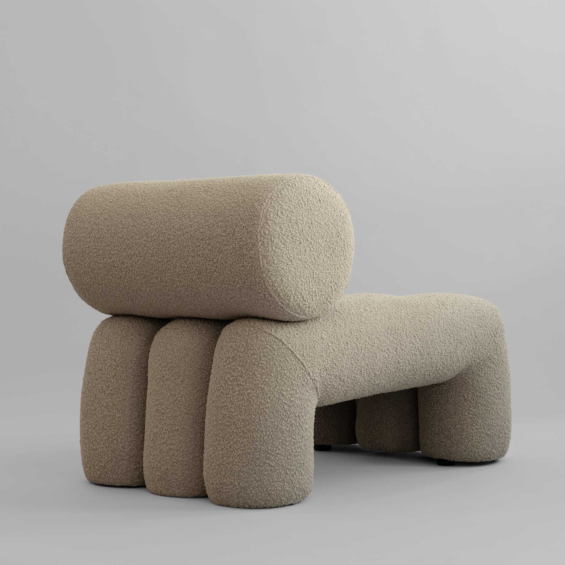 FOKU armchair in sandy boucle