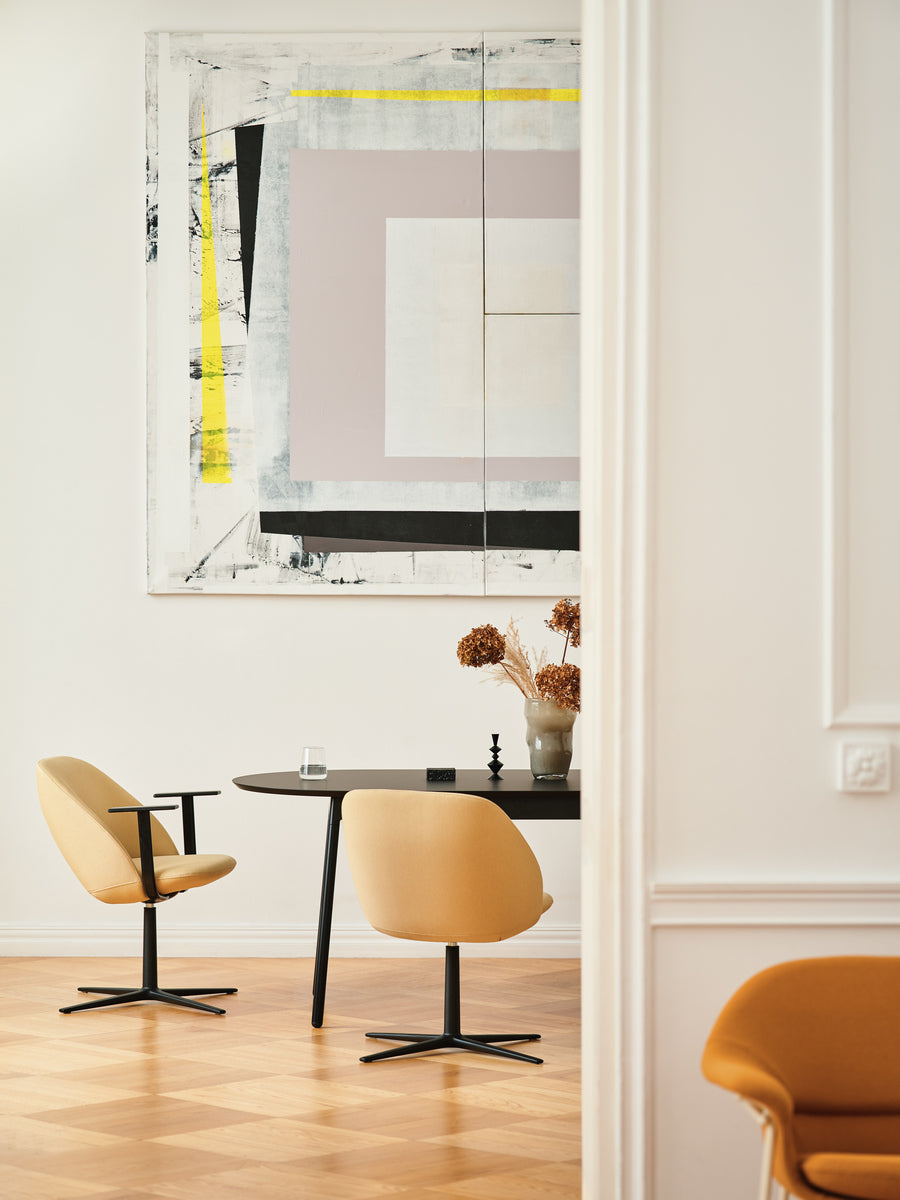 Armchair with low backrest.