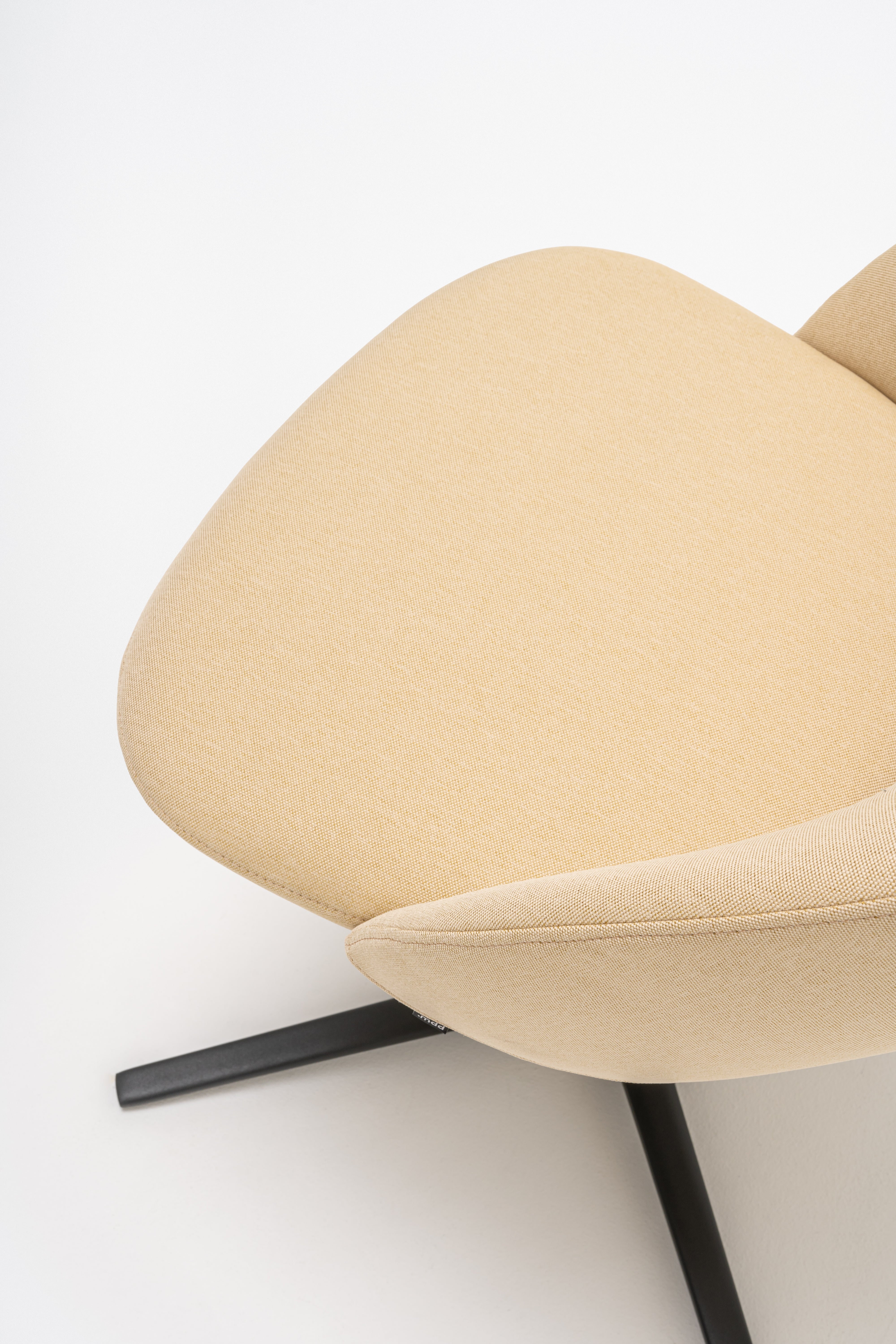 Armchair with low backrest.