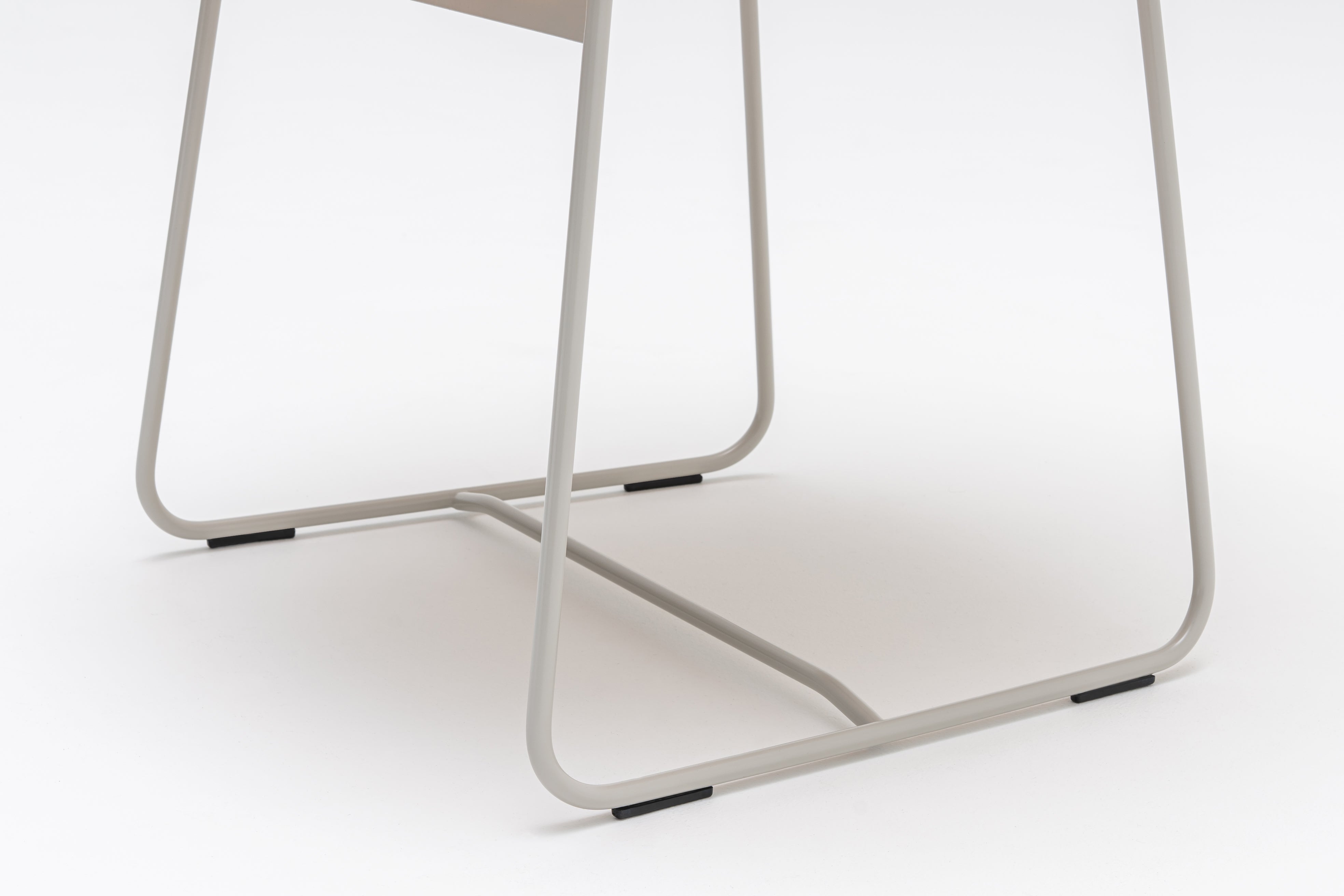 Ultra chair base skid base with footer to the hard surface