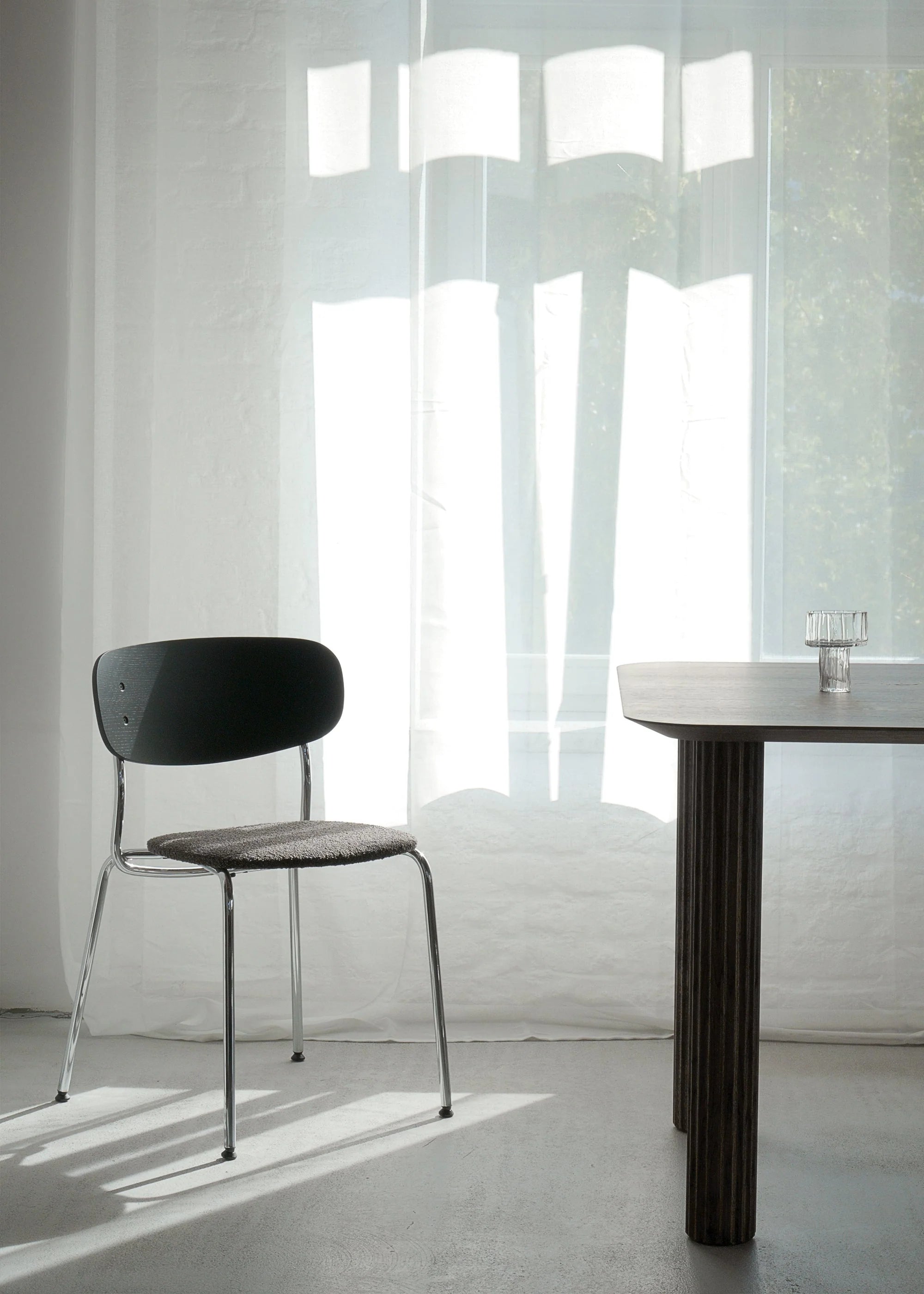 SPLIT SOFT chair black oak wood with chrome base and black bouclé