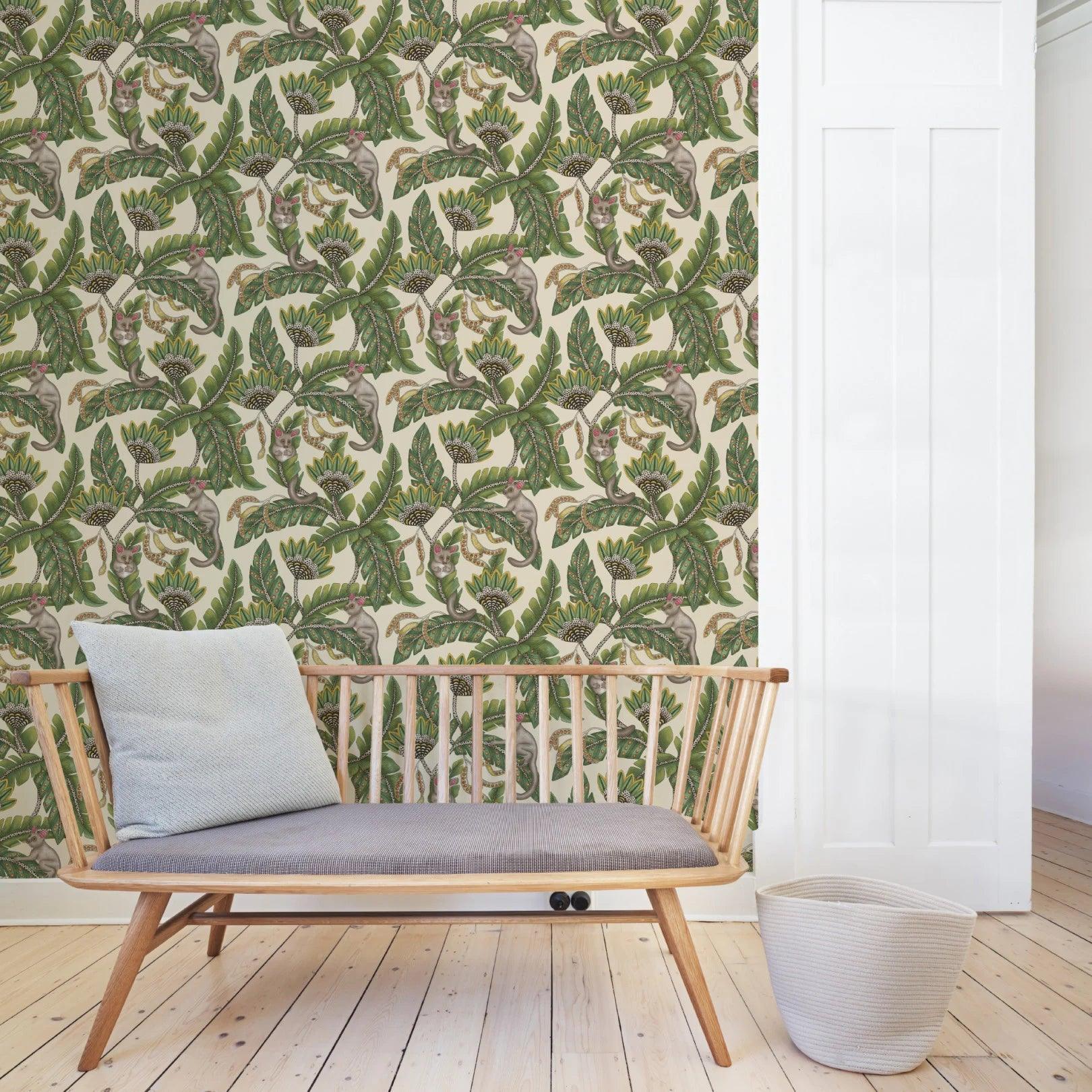 Wallpaper with a plant and animal motif ARDMORE JABULA - Bush Baby turquoise on navy