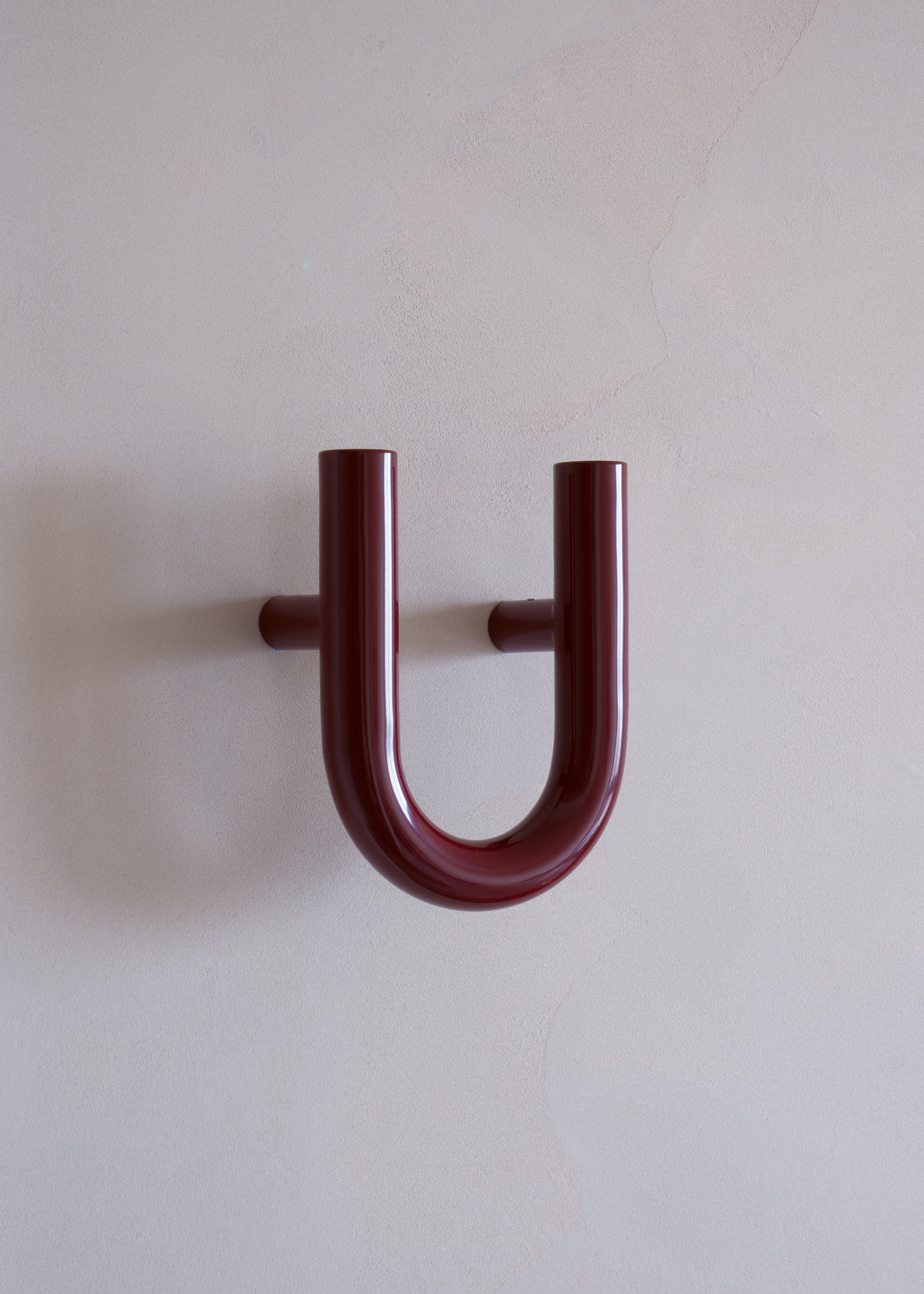 UNE burgundy wall hanger