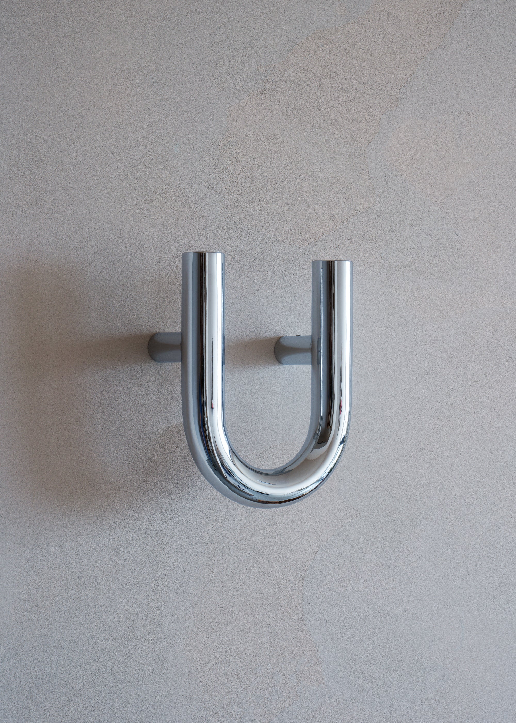 UNE chrome wall hanger